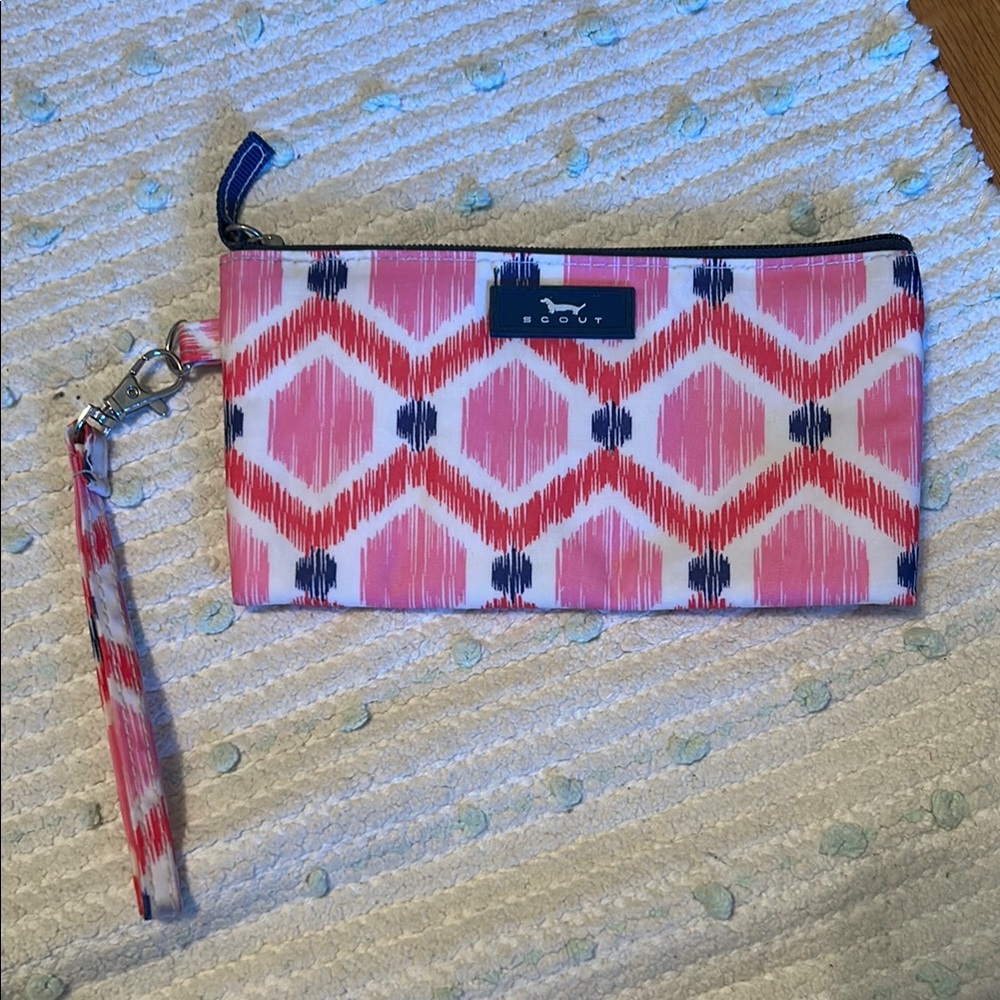 Scout wristlet in pink, blue and coral.   Gently used.